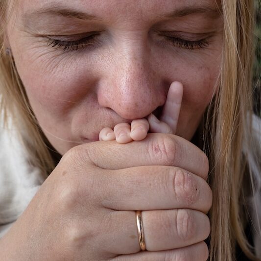 nanny job babies nanny kissing baby hand
